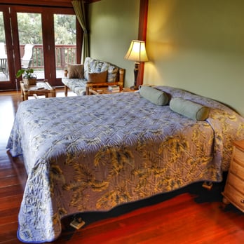 Kauai Garden Cottages - Torch suite showing the queen size pillow-top bed - Vacation Rentals Near Me - Kalaheo, Hawaii Kauai Garden Cottages - Torch suite showing the queen size pillow-top bed - Vacation Rentals Near Me - Kalaheo, Hawaii