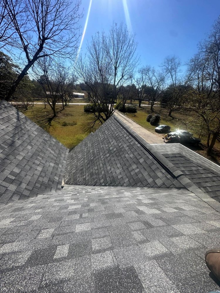 Slide of RCM Roofers