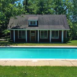 The poolside yoga studio.