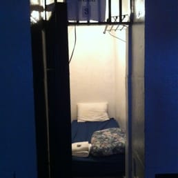 A single cell or 'private room'. Yes, it really is just a bed and a door that can be locked with an iron chain and a padlock. A single cell or 'private room'. Yes, it really is just a bed and a door that can be locked with an iron chain and a padlock.