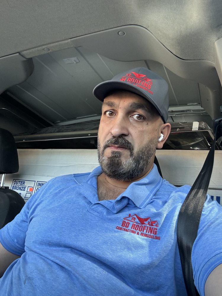 Slide of BD Commercial Roofing