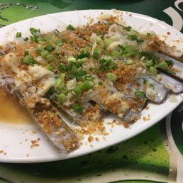 Stir-fried razor clams with black soya bean, chili, garlic, and vermicelli noodles. Stir-fried razor clams with black soya bean, chili, garlic, and vermicelli noodles.