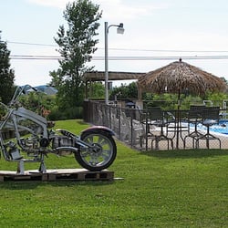 Lanz's Motel Cottages & Trailer Park - Inground swimming pool, a playground, beach front bonfire pits and a sandy beach on the premises.