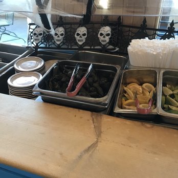 Guadalajara Grill - There is a little salsa bar inside that has fried jalapeño's limes, pico, salsa etc., self serve ;) - Mexican Near Me - Taos, New Mexico