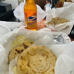 Pupussa and a soda Pupussa and a soda