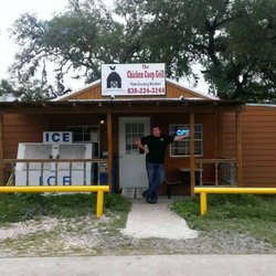 The Chicken Coop Grill - Owner in front of the Chicken Coop Grill