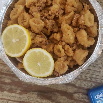 Michelangelo's Pizza - a bowl of pasta and lemon slices - Pizza Near Me - Staten Island, New York