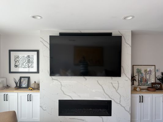 Above Fireplace TV Mount - Fireplace TV mounting project completed with precise leveling and secure installation. The TV was mounted above the fireplace with clean alignment and a modern, professional finish. Above Fireplace TV Mount - Fireplace TV mounting project completed with precise leveling and secure installation. The TV was mounted above the fireplace with clean alignment and a modern, professional finish.