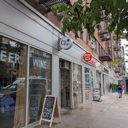 a beer shop on a city street a beer shop on a city street