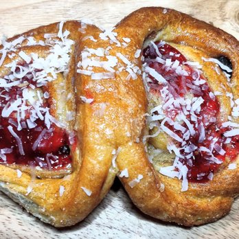 Panadería Aguascalientes - two pastries on a cutting board - Bakeries Near Me - Lexington, Kentucky