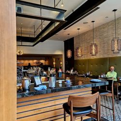 Indoor dining at the bar or booths