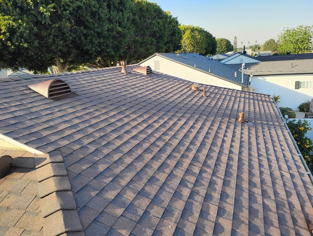 Slide of Sam's Roofing Co