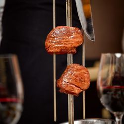 Chama Gaúcha - Downers Grove - Filet mignon served tableside at Chama Gaucha Brazilian steakhouse