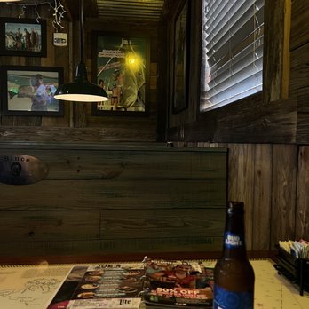 Flanigan’s - a bottle of beer on a table - Seafood Near Me - Sunrise, Florida