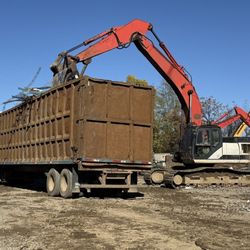 American Steel Processing - Grapple Filling Trailer