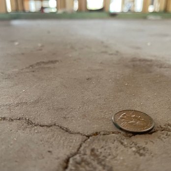 Taylor Morrison - Crack in floor that runs from front door to back sliding glass door - Home Developers Near Me - Scottsdale, Arizona