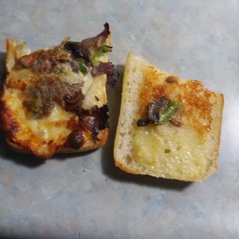 Domino's Pizza - two pieces of pizza on a table - Pizza Near Me - Mount Washington, Kentucky
