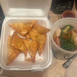 Wonton, soup, crab Ragoon and orange chicken allegedly
