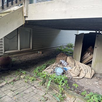 Sunshine Junk Removal - Under the deck in the neighbors yard. - Junk Removal & Hauling Near Me - Rochester, Minnesota Sunshine Junk Removal - Under the deck in the neighbors yard. - Junk Removal & Hauling Near Me - Rochester, Minnesota