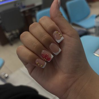 Top Beauty Nails & Spa - Nail design with flower and golden stones - Nail Salons Near Me - Clermont, Florida Top Beauty Nails & Spa - Nail design with flower and golden stones - Nail Salons Near Me - Clermont, Florida
