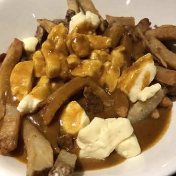 The Celtic Hearth - Irish curried chips with cheese curd - American Near Me - St John's, Newfoundland and Labrador