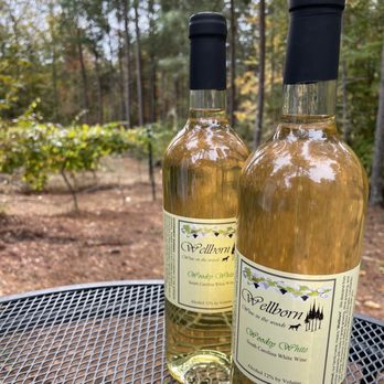 Wellborn Winery - two bottles of wine on a table - Wineries Near Me - Travelers Rest, South Carolina Wellborn Winery - two bottles of wine on a table - Wineries Near Me - Travelers Rest, South Carolina