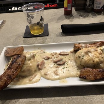 Frozen Pirogue - Biscuits n gravy with andouille sausage. - Cajun/Creole Near Me - Bossier City, Louisiana Frozen Pirogue - Biscuits n gravy with andouille sausage. - Cajun/Creole Near Me - Bossier City, Louisiana