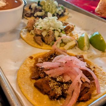 La Chancla Mexican Grill - (from front to back) Chicken mole, chile verde, carne asada. - Mexican Near Me - Long Beach, California