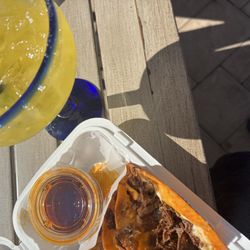 Taco Birria with dipping sauce