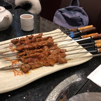 Xin Jiang Restaurant - B01. BBQ Lamb Kabob: This is a winner. You can enjoy the lamb BBQ and play with epic steel skewers. - Chinese Near Me - Markham, Ontario