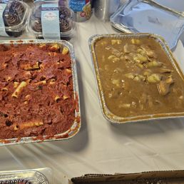 Tray of sugo pasta and chicken piccata Tray of sugo pasta and chicken piccata