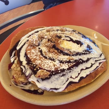 Snooze, an A.M. Eatery - My friend's plate. Blueberry pancakes I believe? - Breakfast & Brunch Near Me - Gilbert, Arizona Snooze, an A.M. Eatery - My friend's plate. Blueberry pancakes I believe? - Breakfast & Brunch Near Me - Gilbert, Arizona