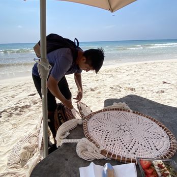 Ahau Tulum - Working his ass off in this heat with his whole family. Gorgeous art - Hotels Near Me - Tulum, ROO