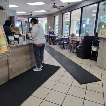 Bagel & - Inside and where you pay if you get to go - Bagels Near Me - Boynton Beach, Florida