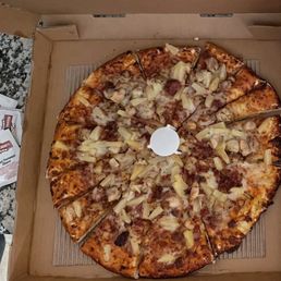 Large chicken luau, uneven slices (lines of cuts do not line up), dry, not much cheese or toppings. Large chicken luau, uneven slices (lines of cuts do not line up), dry, not much cheese or toppings.