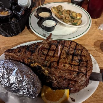 Five D Cattle - The Cowboy Ribeye (20-22oz.) Cooked medium rare with a side salad and baked potato - Steakhouses Near Me - Avinger, Texas Five D Cattle - The Cowboy Ribeye (20-22oz.) Cooked medium rare with a side salad and baked potato - Steakhouses Near Me - Avinger, Texas