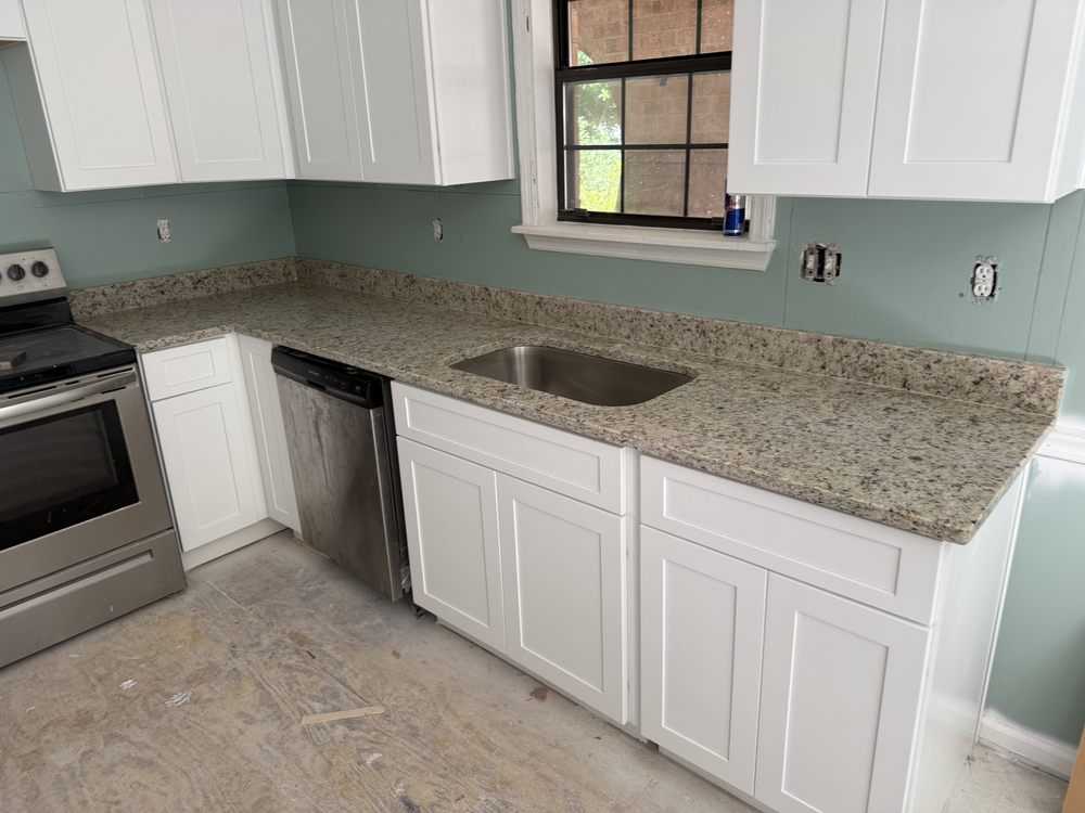 Slide of Hammerhead Roofing and Renovations