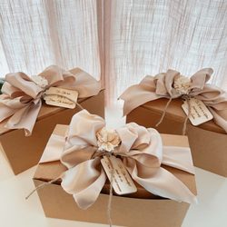 Cici 'n Tux - Custom gift boxes with engraved hang tags.