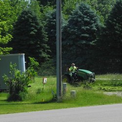 Wathen Development - The home owners association cutting the grass on a lot that Wathen Development is neglecting... No surprise there.
