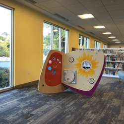 El Sobrante Library - Big windows with kids play fixture.