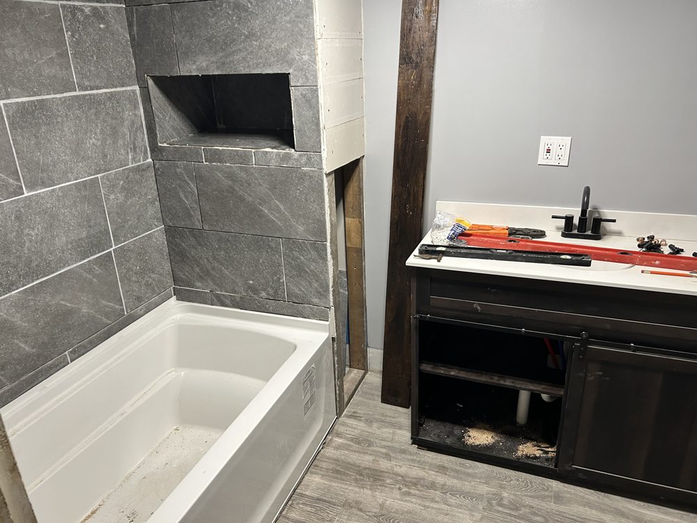 Slide of Houseweart’s Plumbing and Heating