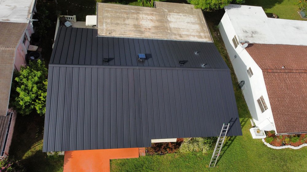 Slide of Dream Team Roofing