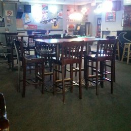 tables and chairs in a restaurant tables and chairs in a restaurant