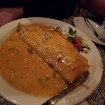 Chuy's - Chicken and steak burrito with queso - Tex-Mex Near Me - Kissimmee, Florida Chuy's - Chicken and steak burrito with queso - Tex-Mex Near Me - Kissimmee, Florida
