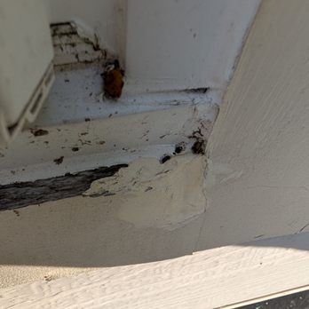 Nations Choice Exteriors - This is the corner of one of the windows they replaced. They caulked over a damaged area of the frame. - Roofing Near Me - Alexandria, Virginia Nations Choice Exteriors - This is the corner of one of the windows they replaced. They caulked over a damaged area of the frame. - Roofing Near Me - Alexandria, Virginia