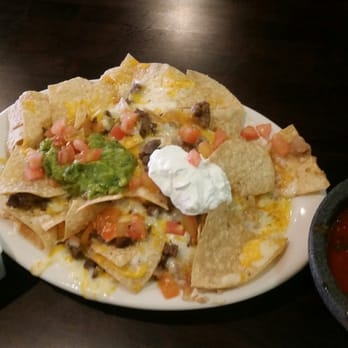 Los Amigos - FULL order Nachos with steak. No beans. It feels like "Where's Waldo?" With the steak. Ok, your turn...find Waldo! - Mexican Near Me - Helendale, California