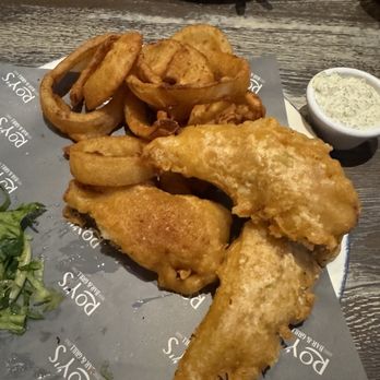 Roy's Bar and Grill - Fish with a side of onion rings - Bars Near Me - Carson City, Nevada Roy's Bar and Grill - Fish with a side of onion rings - Bars Near Me - Carson City, Nevada