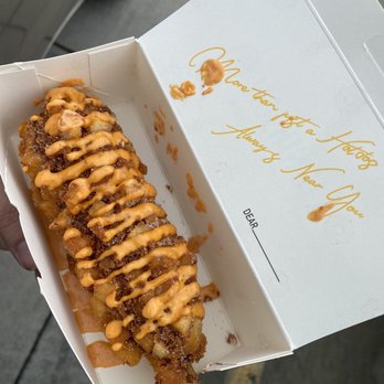 Mochinut - Potato half mozzarella and half beef $5.99 with sugar and spicy mayo - Hot Dogs Near Me - Fresno, California Mochinut - Potato half mozzarella and half beef $5.99 with sugar and spicy mayo - Hot Dogs Near Me - Fresno, California