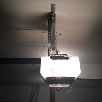 North Shore Garage Doors - the creative way he wrapped the wire around the pole 10 times versus taking the time to actually do quality work.. - Garage Door Services Near Me - Wilmette, Illinois