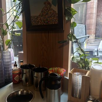 Fourth Wall - A station to grab creamer, lids, and straws - Coffee & Tea Near Me - New Orleans, Louisiana Fourth Wall - A station to grab creamer, lids, and straws - Coffee & Tea Near Me - New Orleans, Louisiana